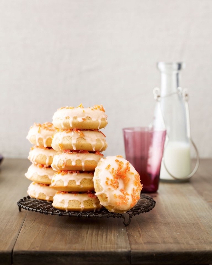 easy brunch recipes, stack of donuts, with white frosting, milk in a bottle, wooden table