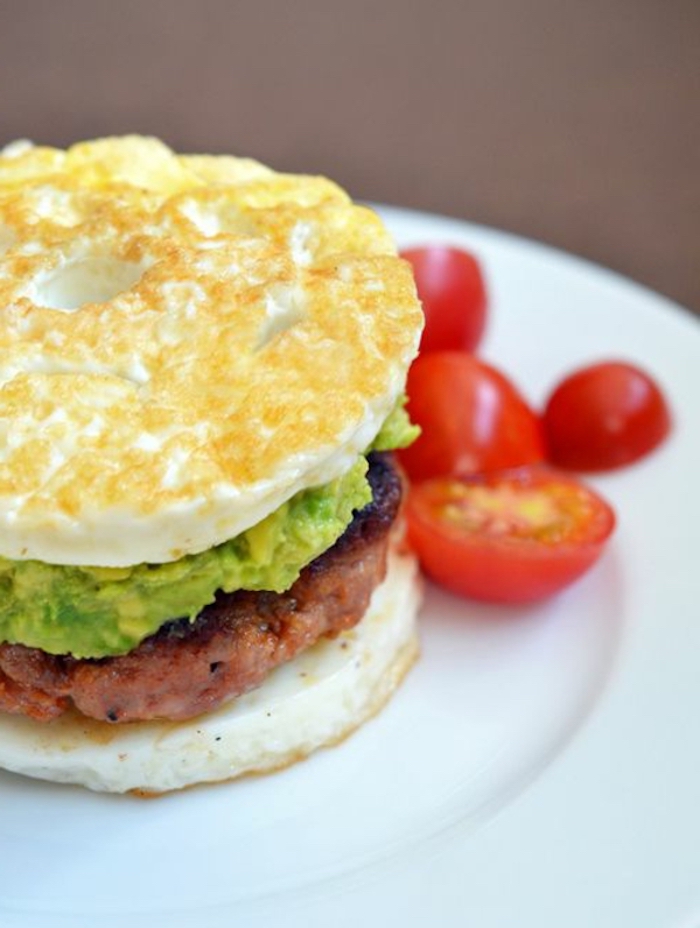 chopped cherry tomatoes, great breakfast ideas, eggs with avocado, beef burger in the middle