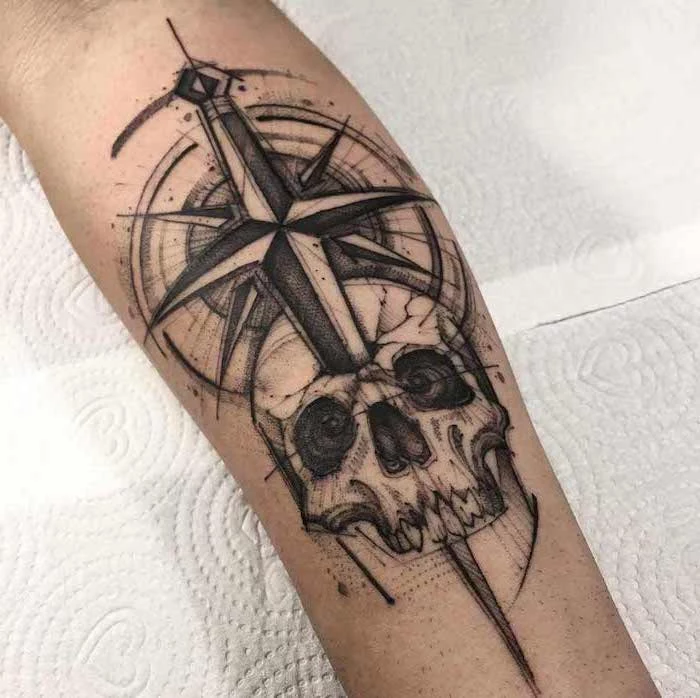 anchor and compass tattoo, compass arrow, piercing a skull, white sheet of paper
