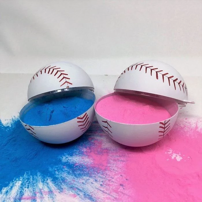 two plastic baseballs, gender reveal box, filled with pink and blue powder