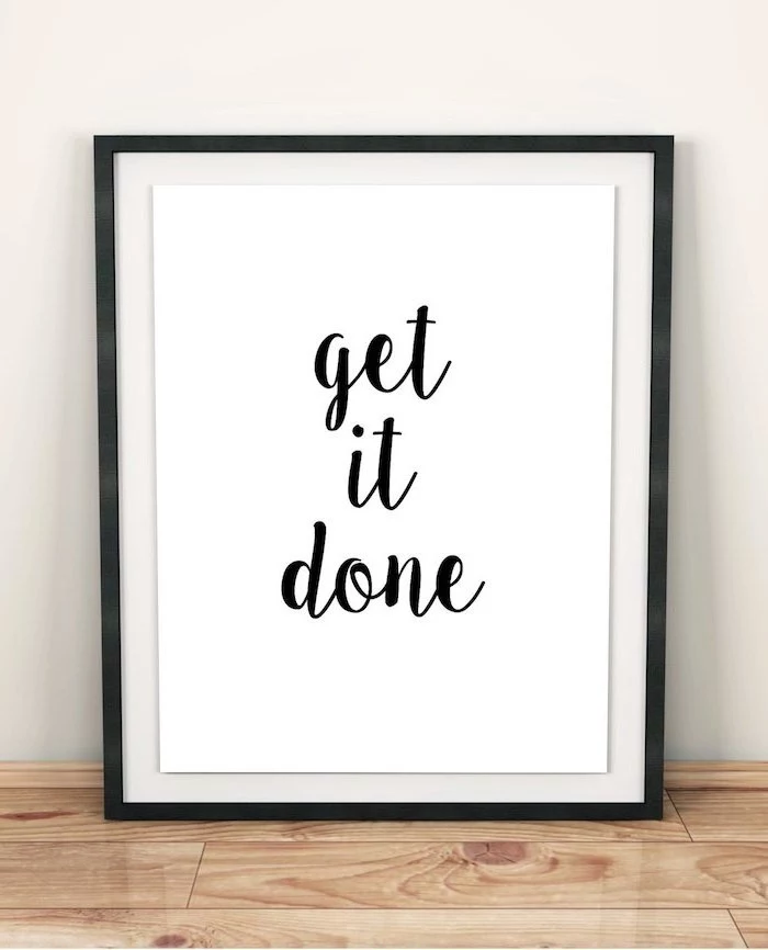 get it done, framed inspirational quote, on wooden desk, desk decor ideas, white wall
