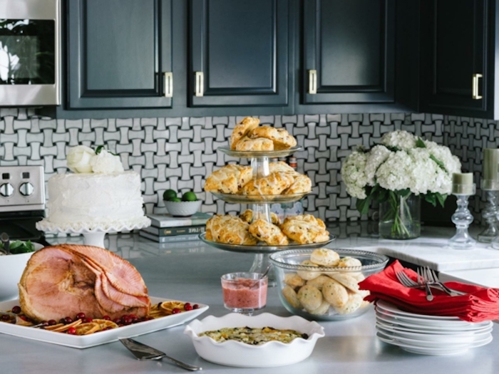 brunch table, large ham, baked casserole, white cake, plates and forks, best brunch recipes