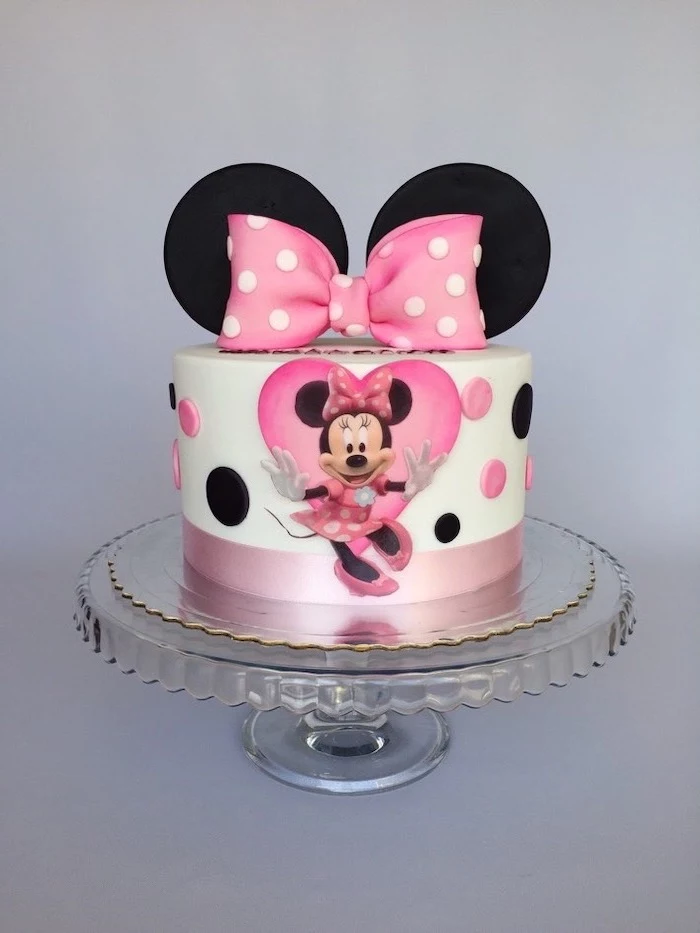 pink bow, black ears, minnie cake, white fondant, glass cake stand, grey background