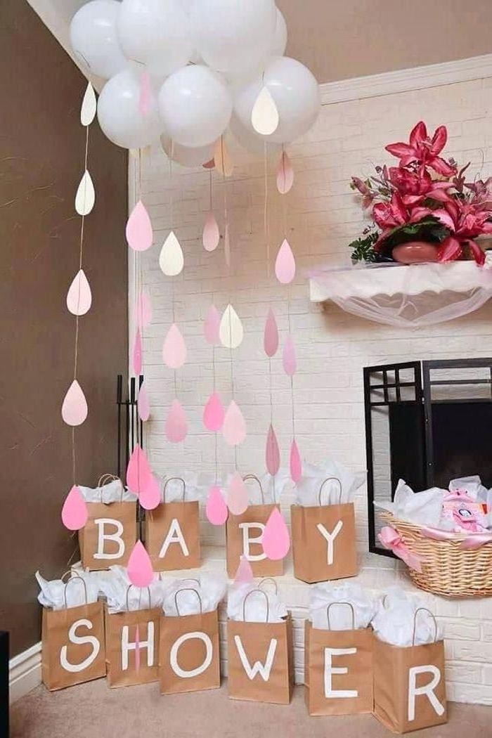 cloud made of balloons, paper rain drops, baby shower, gift bags, when to have a baby shower