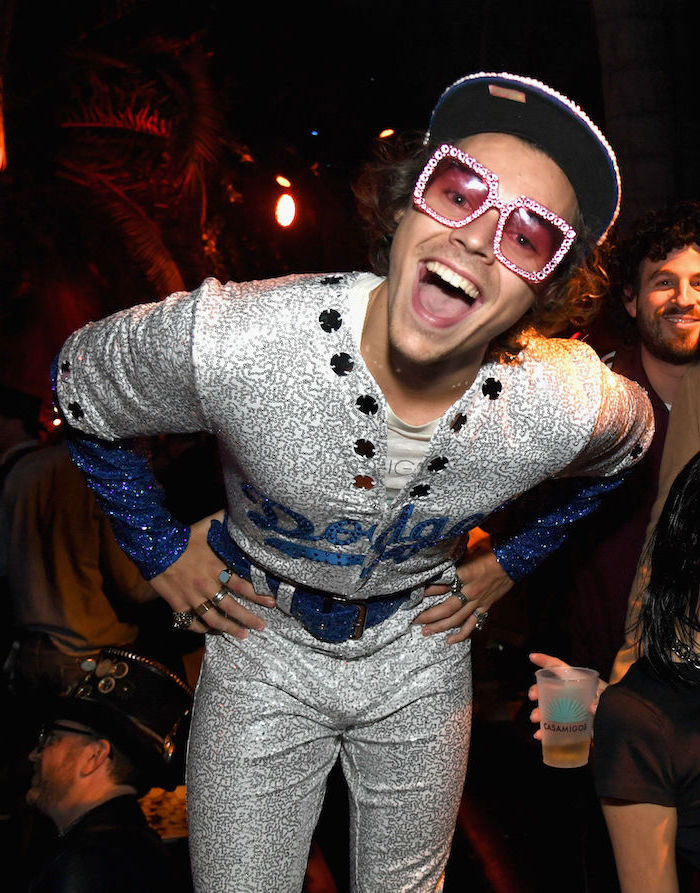 harry styles, dressed as elton john, dodgers suit, easy halloween costumes, pink sunglasses