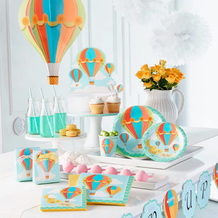 hot air balloon, party theme, colorful decorations, cupcakes and macarons, cake pops, baby shower decorations