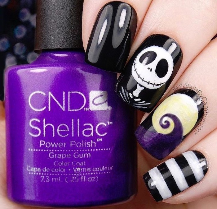 black nail polish, purple nail polish bottle, jack skellington, nightmare before christmas, black and gold nail designs