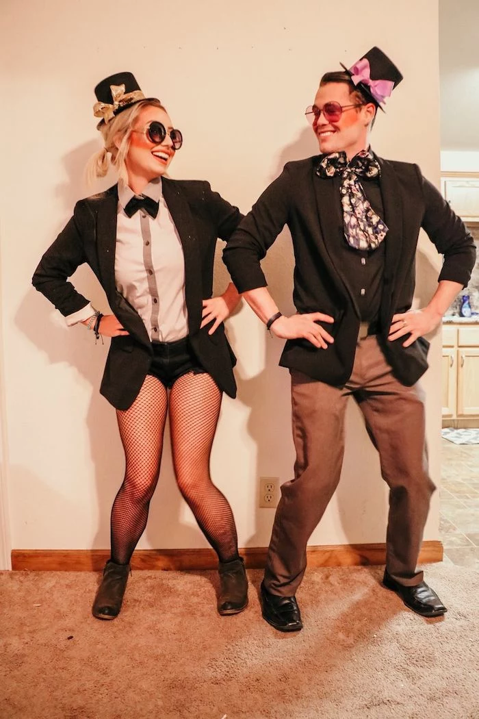 man and woman, dressed in suits, creative halloween costumes, wearing sunglasses, small hats