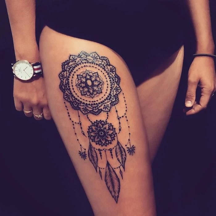 mandala tattoo, dream catcher tattoo design, thigh tattoo, black shorts, black background