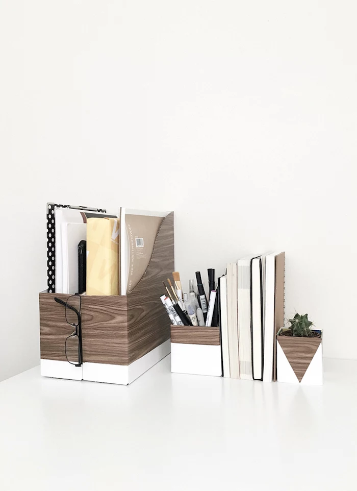 wooden folders, potted succulent, pencil holder, cute office decor, books in between, white desk