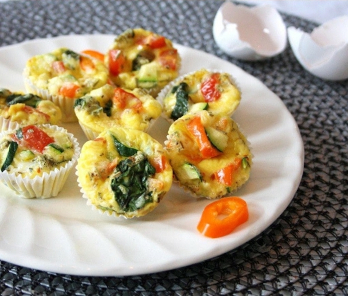 egg muffins, birthday breakfast ideas, spinach and peppers, on white plate