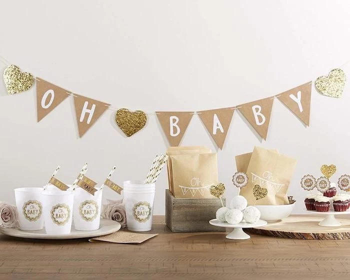 oh baby garland, on white wall, rustic decor, baby shower decoration ideas for girl, wooden table