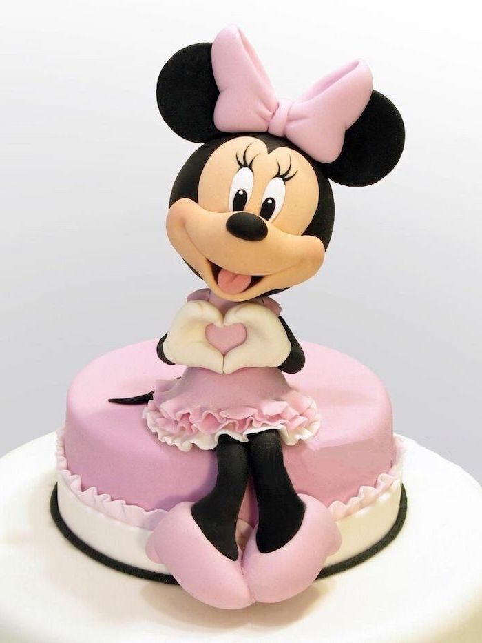 pink and white fondant, minnie mouse cake topper, white background