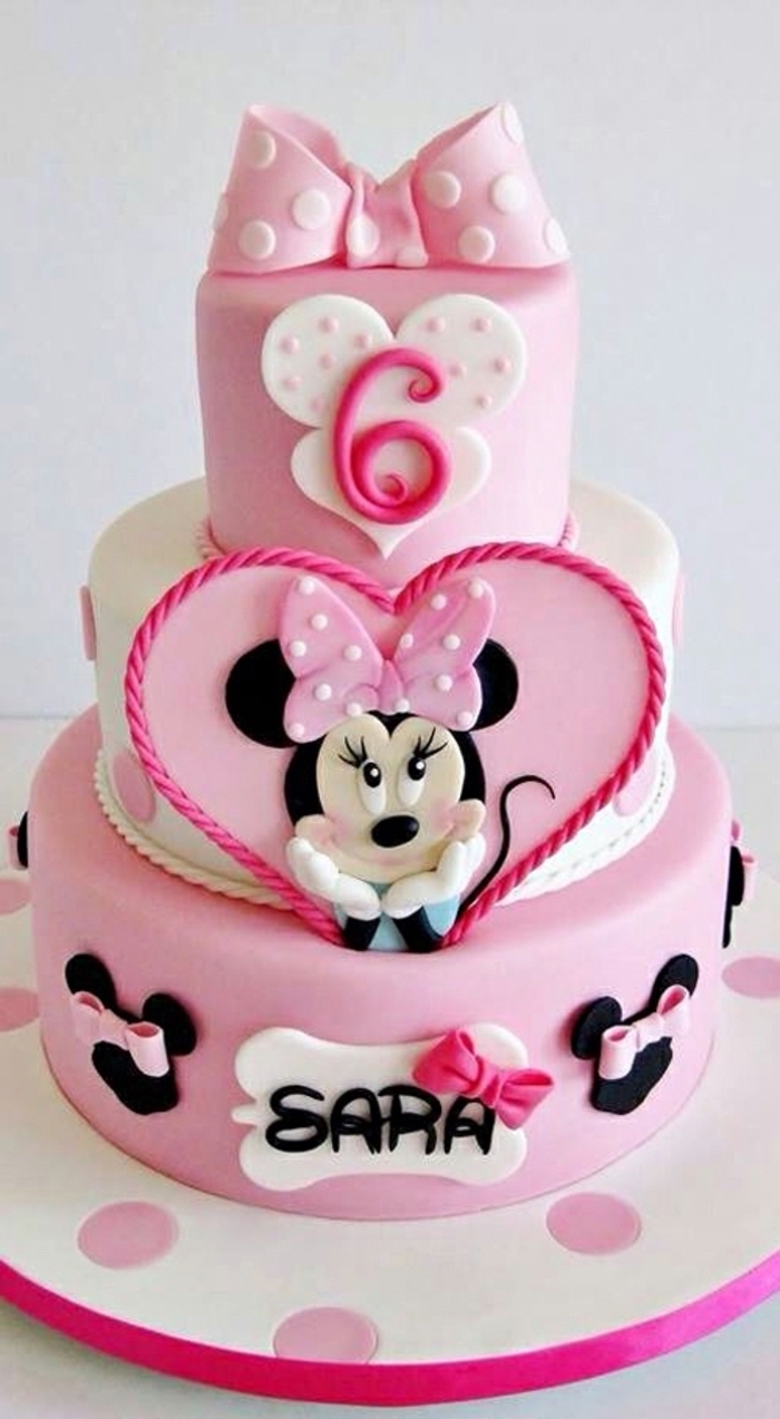 minnie mouse cake decorations, three tier cake, pink and white fondant, pink bow, white background