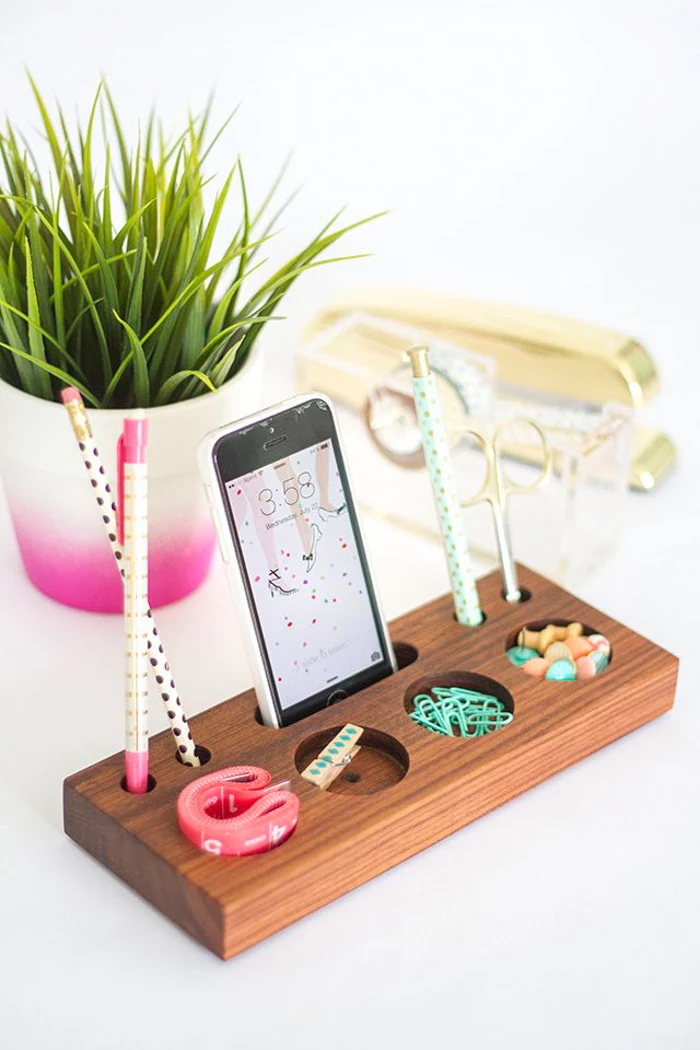 wooden desk organiser, phone holder, potted plant, cool office decor, white desk, gold desk accessories