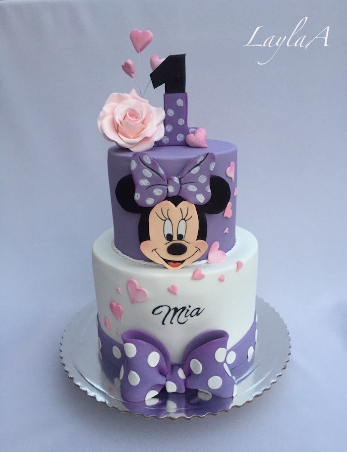 purple and white fondant, two tier cake, minnie mouse cake decorations, silver cake stand