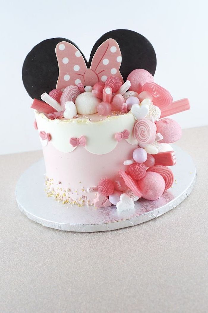 pink and white fondant, minnie mouse pics, silver tray, candy decorations, pink bow