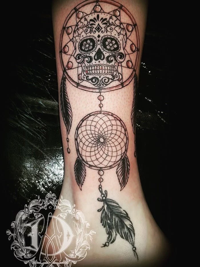 skull inside a dreamcatcher, dream catcher tattoo on arm, leg tattoo, black background, best friend dream catcher tattoo