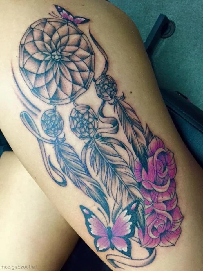 pink roses, pink butterflies, dream catcher tattoo on back, thigh tattoo