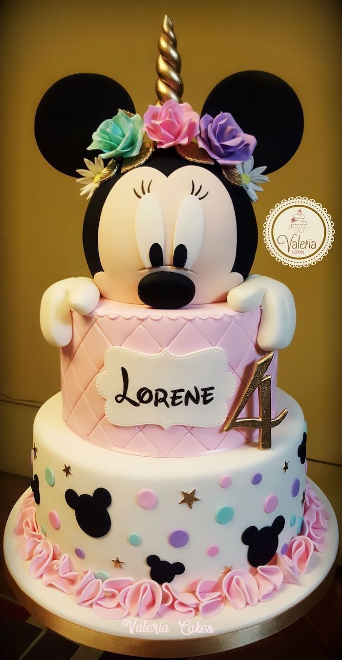 three tier cake, pink and white fondant, pink frosting, minnie mouse pics, unicorn horn