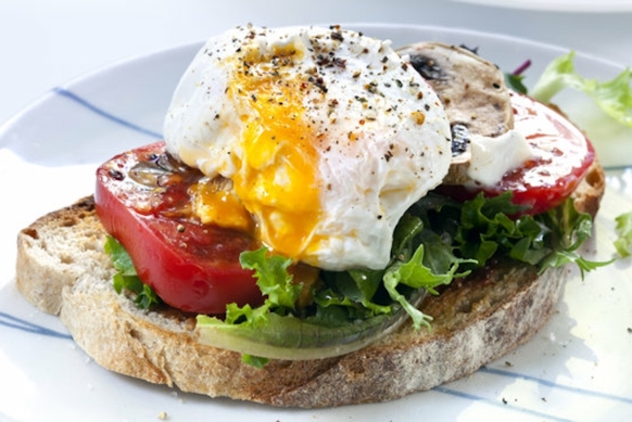 avocado toast, with green salad, things to make for breakfast, tomatoes and eggs, white plate