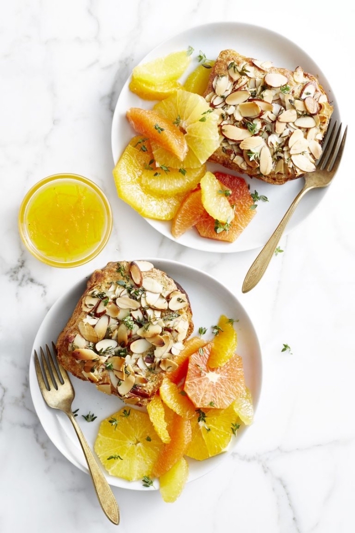 vegan brunch recipes, toast with nuts, orange and grapefruit slices on the side, orange juice