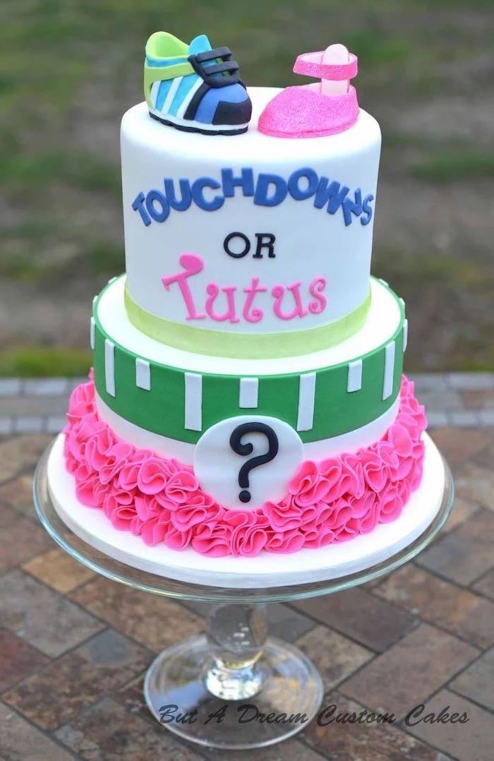 touchdowns or tutus, two tier cake, gender reveal cake ideas, glass cake stand