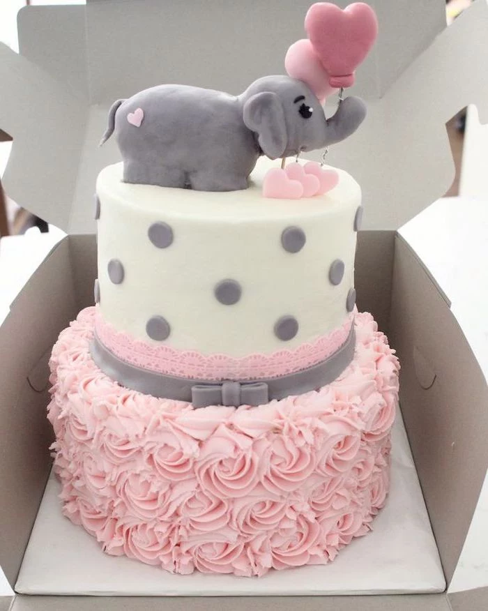 two tier cake, white fondant, pink frosting, baby girl baby shower themes, small elephant, carton box