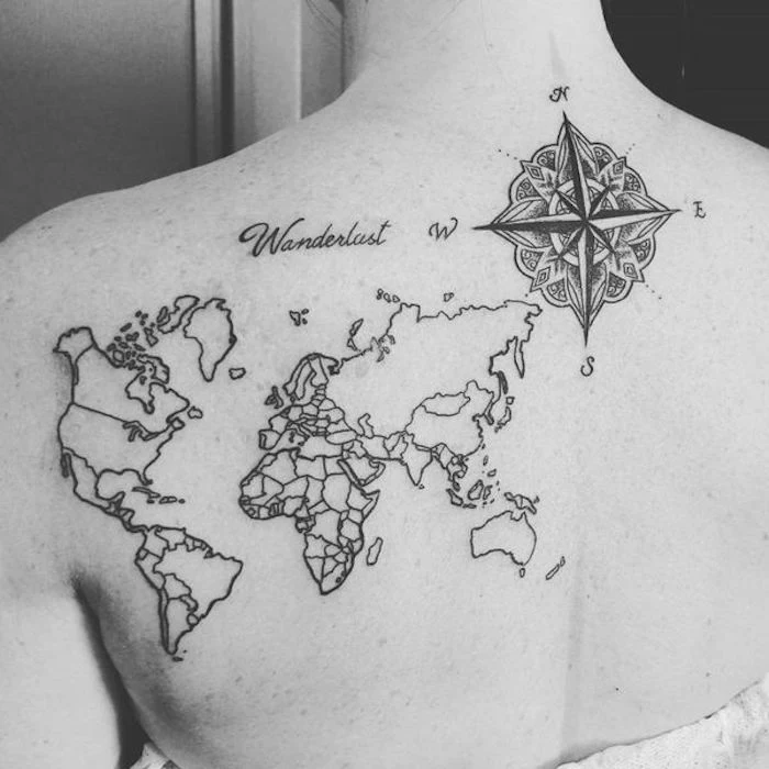 map of the world, compass tattoo forearm, wanderlust cursive text, back tattoo, black and white photo