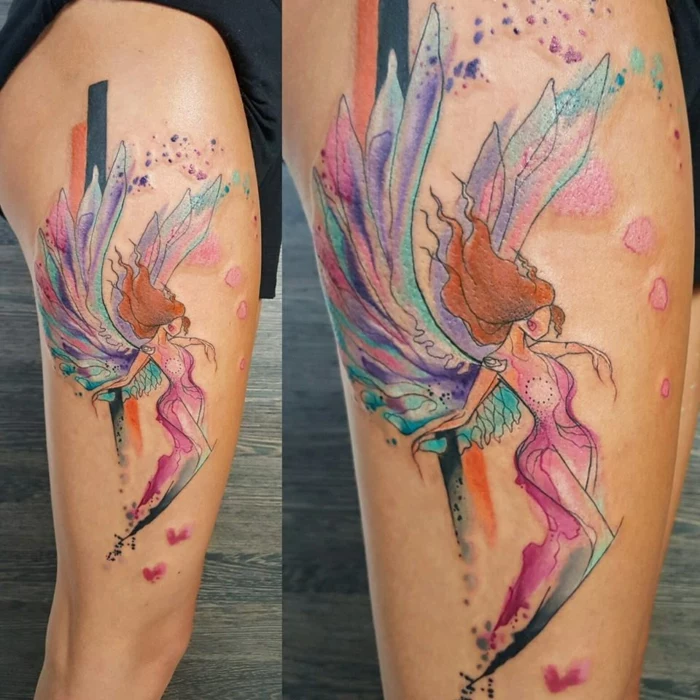 large thigh tattoo, watercolor angel wings tattoo, female angel with long ginger hair