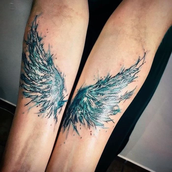 watercolor tattoo, blue colors, forearm tattoo, on both arms, cross with wings tattoo, white background