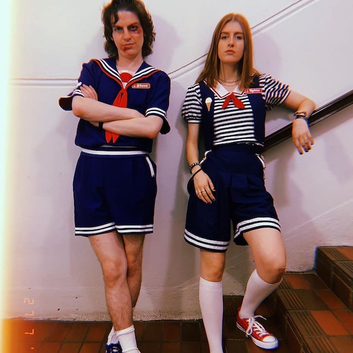 steve and robin, stranger things characters, halloween costume ideas for men, leaning on a wall
