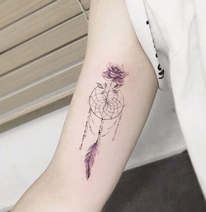 dream catcher tattoo ideas, inside arm tattoo, colored tattoo, purple rose, purple feather