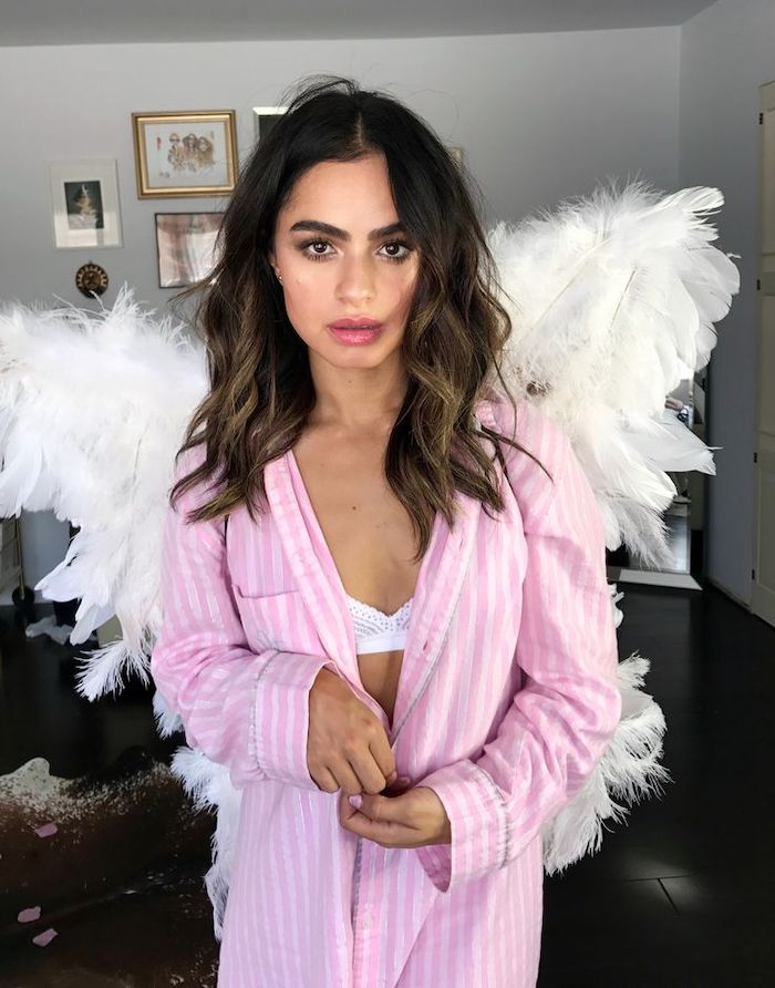 last minute halloween costumes, woman dressed as victoria's secret angel, pink shirt, angel wings