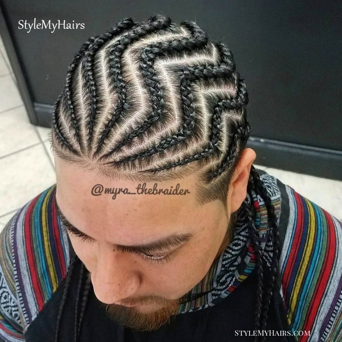 zig zag braids, man with black hair, wearing a colorful sweatshirt, braids for men with short hair