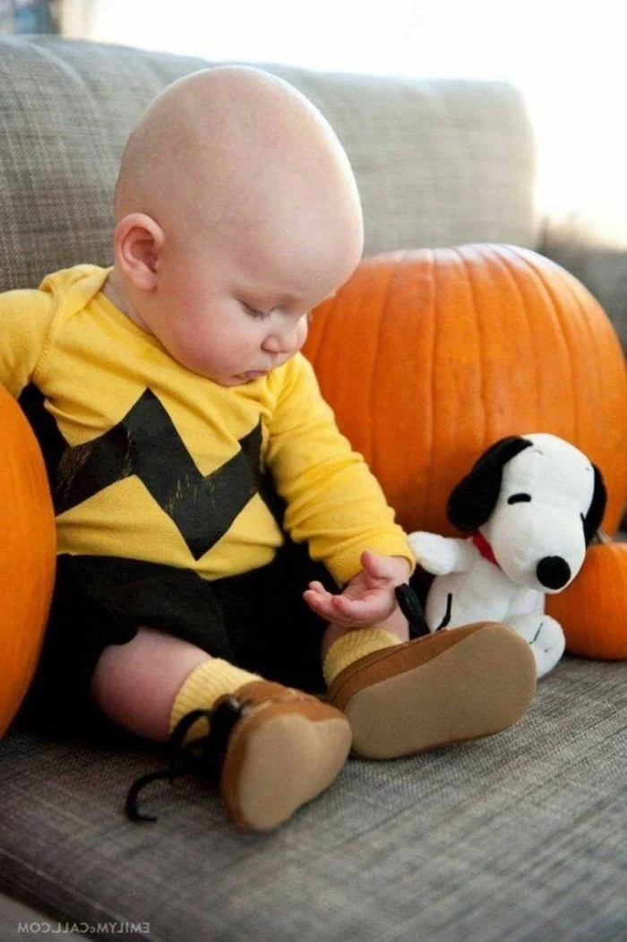 baby boy, dressed as charlie brown, surrounded by pumpkins, sitting on couch, dog plush toy, toddler girl halloween costume