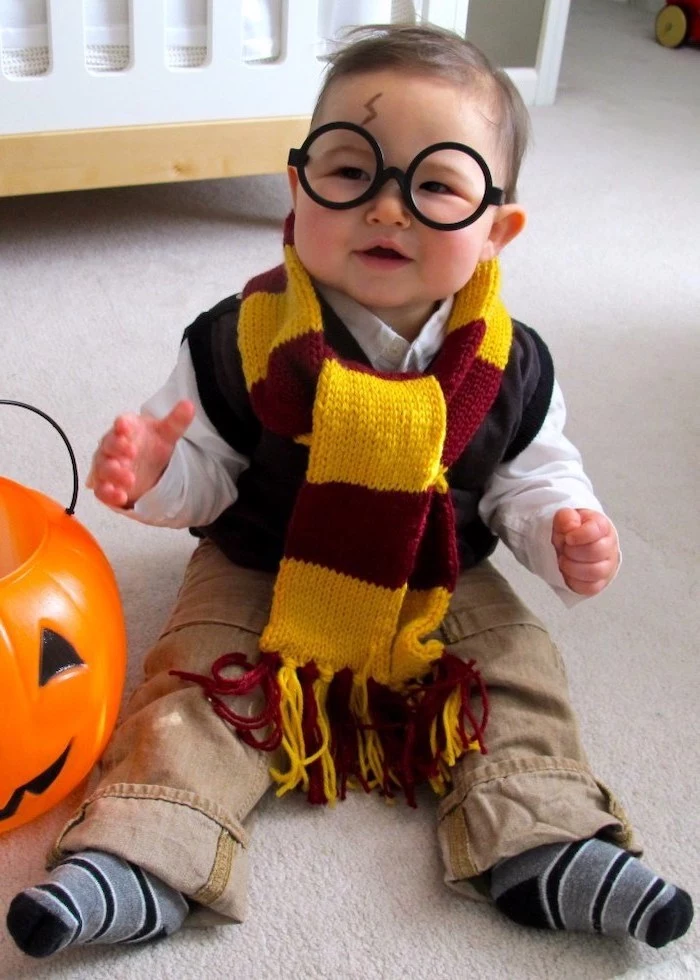 little boy, dressed as harry potter, round glasses, gryffindor scarf, halloween costumes for girls, lightning bolt scar