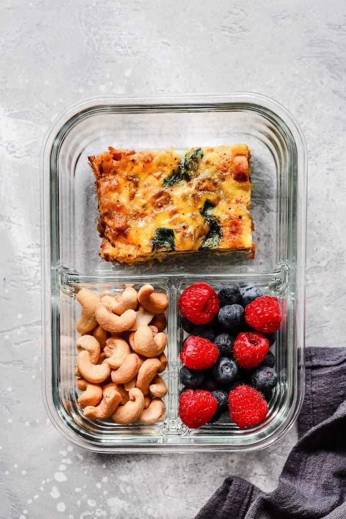 egg casserole, blueberries and raspberries, easy meal prep ideas, nuts in a glass container