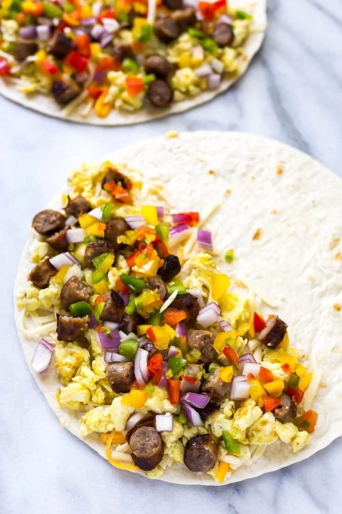tortilla wraps, filled with vegetables and sausages, meal prep ideas, breakfast quesadillas, marble countertop