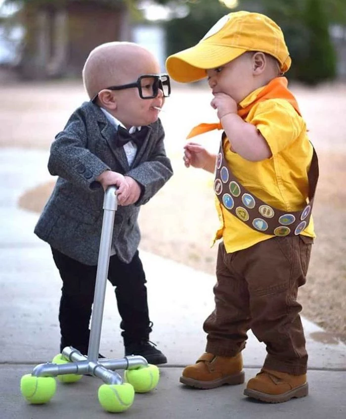 two boys, dressed as carl and russel, up movie inspired, toddler boy costume, metal cane, yellow shirt