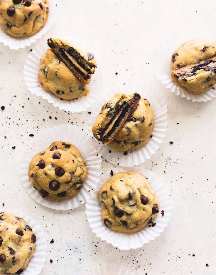 cookie dough muffins, white muffin paper, easy chocolate chip cookies recipe, cookie crumbs, scattered on the table