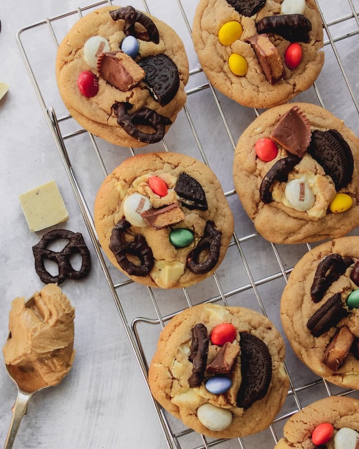 cookies with peanut butter, oreos and pretzels, reeses pieces, soft chocolate chip cookies, metal rail