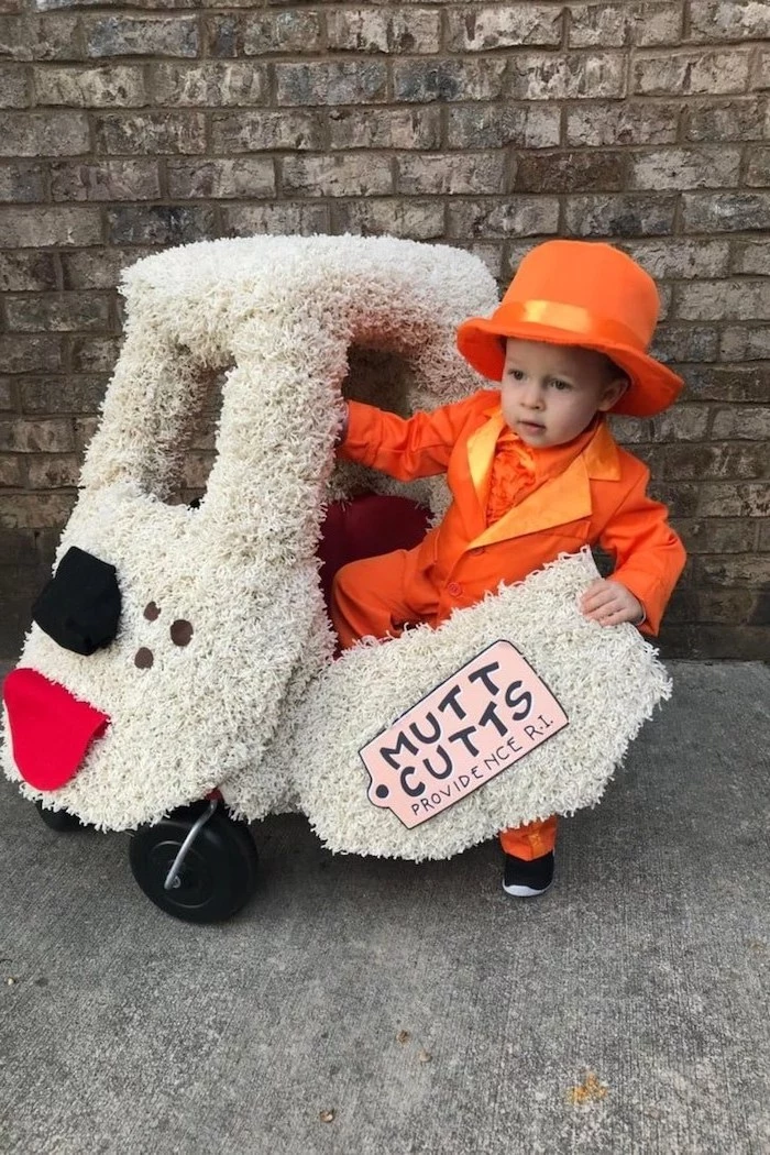 little boy, dressed as lloyd, dumb and dumber inspired, best halloween costumes, getting inside the puppy car