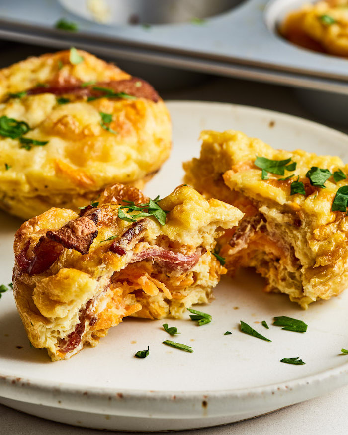 egg muffins, with bacon and parsley on top, white plate, ketogenic diet recipes