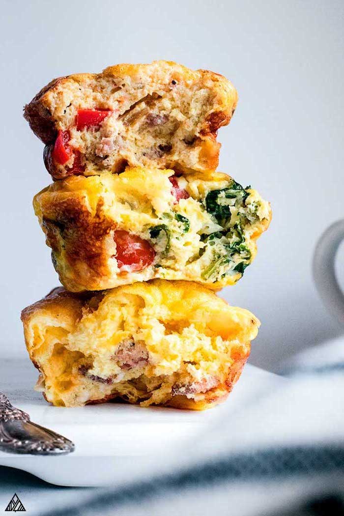 egg muffins, with tomatoes, bacon and spinach, low carb breakfast recipes, white background