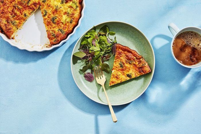 egg and spinach casserole, low carb breakfast recipes, green salad on the side, blue plate, coffee mug