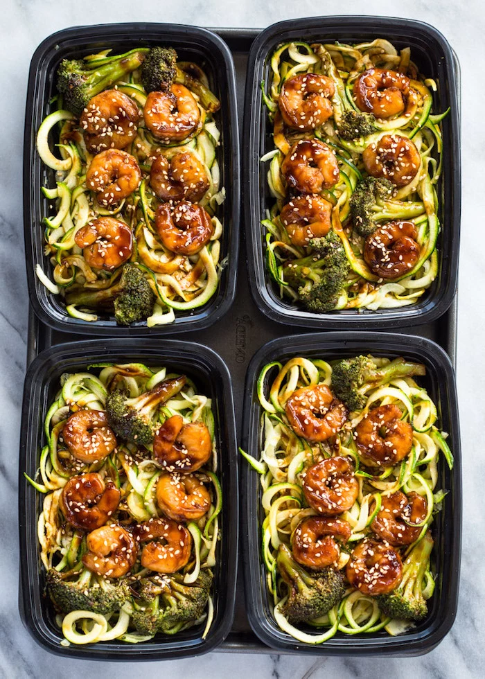 four black containers, zoodles with shrimp, how to cook spiralized zucchini noodles, roasted broccoli