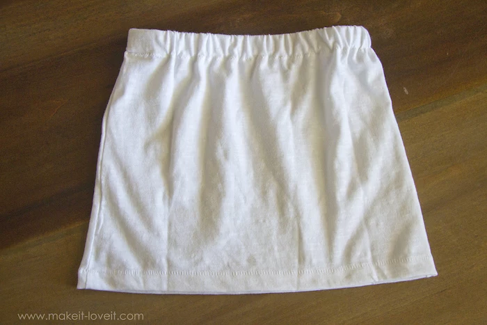 white skirt, on a wooden table, diy tutorial, best halloween costumes, step by step