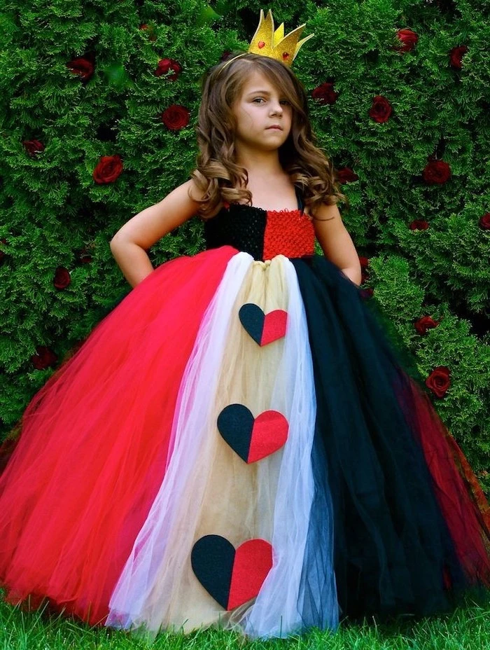 girl dressed as queen of hearts, white black and red, tulle gown, cool halloween costumes, gold crown