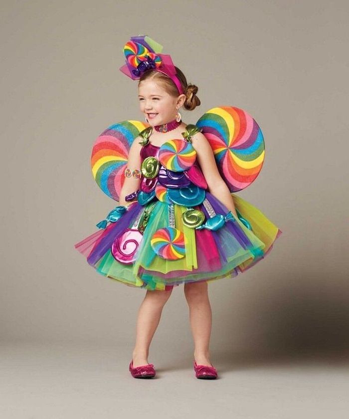 girl with blonde hair, dressed as candy, tulle skirt, halloween costume ideas for girls, colorful costume